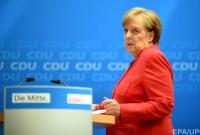 Меркель дали две недели на решение проблемы беженцев