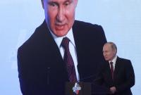 После вторжения на Донбасс, аннексии Крыма и войны в Сирии Путин назвал Россию "миролюбивым государством"